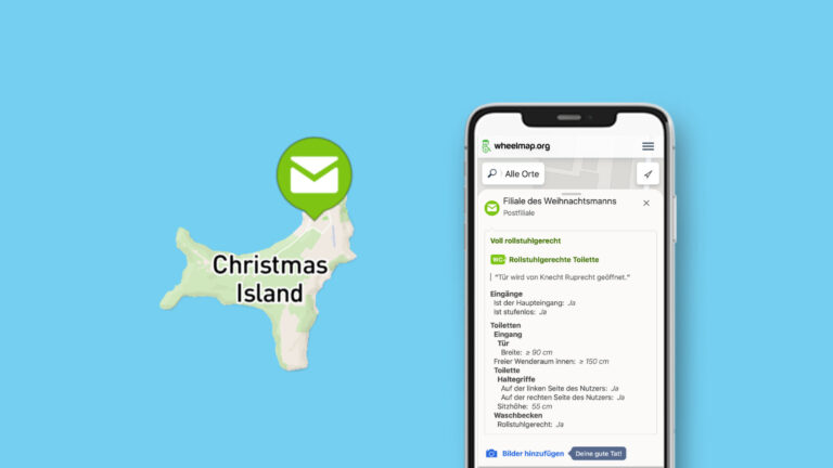 Man sieht eine Kartenansicht der australischen Insel Christmas Island auf Wheelmap.org, ein grüner Pin mit Briefsymbol sitzt a der oberen Spitze. Daneben ist ein Smartphone-Bildschirm mit den Ortsdetails. Der Ort heißt: "Filiale des Weihnachtsmanns". Darunter sind Details zur Rollstuhlgerechtigkeit gelistet.